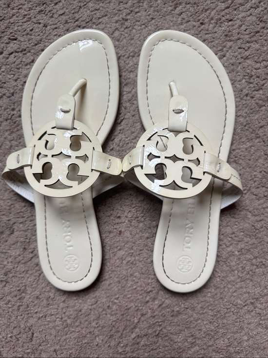 Tory Burch Shoes - Tory Burch Patent Logo Thong Sandals in Off-White